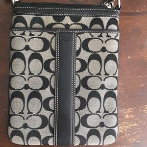 Coach cross body black and grey purse